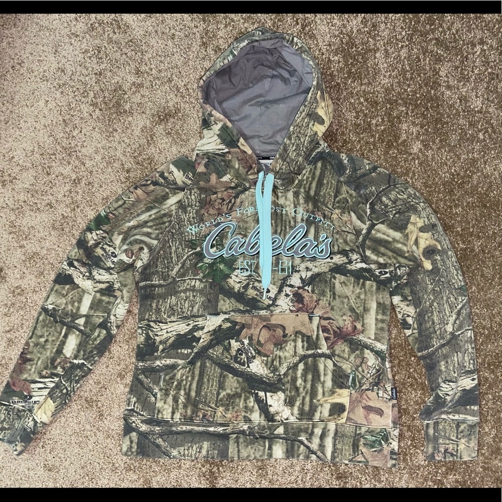 Brand: Cabela’s. Size: S. Colour: Green Camouflage